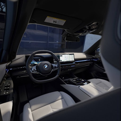 Front interior of a BMW 540i.