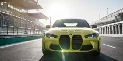 An image of a lime green sedan with one of the best BMW engines