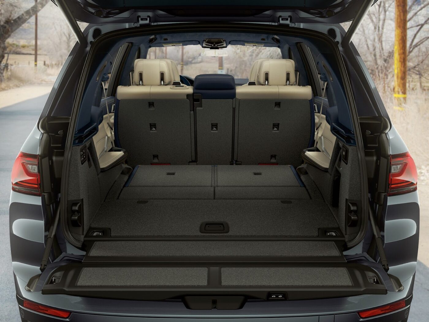 2025 BMW x7 Trunk open with all of the seats down. trunk is pictured to be very spacious.