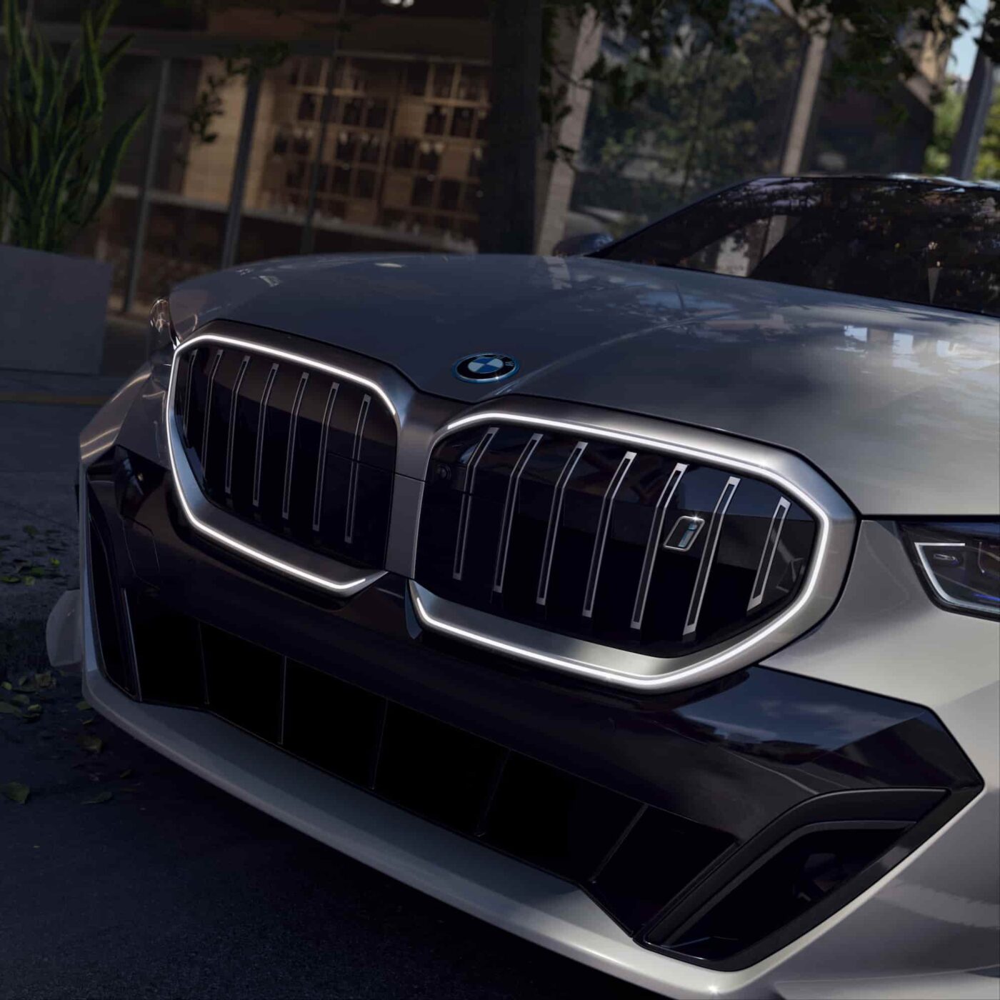 Close-up of BMW i5 M60 front grille showcasing sleek design and illuminated accents.